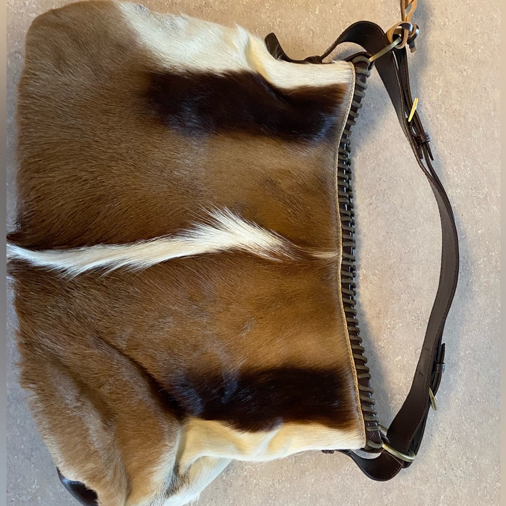 Aqua Madonna over the shoulder handbag. Great condition, only used a few times.